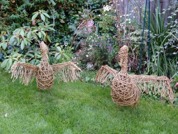 Swan 3 scaled 1 <span style="font-weight: 400">A truly spectacular sculpture, our swan is rearing up with outstretched wings, the head is gracefully tucked in.  He is made from willow with a steel frame for support.  The steel 'legs' are designed to be pushed into the ground in your chosen spot in the garden.</span> <span style="font-weight: 400">Each of our products are handcrafted individual sculptures, which results in unique pieces, with slight differences between them.</span> <span style="font-weight: 400">Our sculptures are made to order and typically take between 2 - 4 weeks to complete. During busy periods, this may take longer, we will advise you by email if this is likely to be the case.</span> <strong>Price includes delivery to the United Kingdom.</strong>