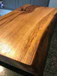 IMG 2550 Character presentation board for cheese, charcuterie, tapas, antipasti. Approx 40-60cm x 20-30cm x 3-5cm thick. Natural shape and edges often with feature holes and knots in surface. Oak/elm/ash/beech/cherry