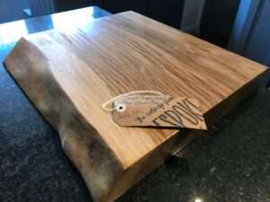 IMG 2781 1 Hardwood chopping board approx 30-40cm wide x 20-25cm deep x 3-6cm thick. Natural waney edge. Oak/elm/ash/beech/cherry
