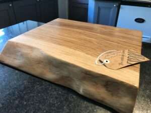 IMG 2782 1 Hardwood chopping board approx 30-40cm wide x 20-25cm deep x 3-6cm thick. Natural waney edge. Oak/elm/ash/beech/cherry