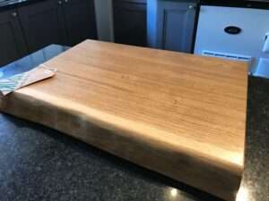 IMG 2786 Hardwood chopping board approx 45-60cm x 30-35cm x 5-7cm thick. Natural waney edge. Oak/elm/ash/beech/cherry