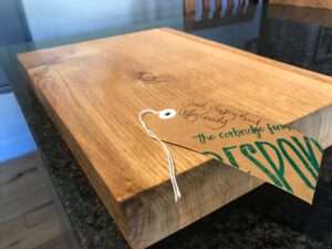 IMG 2789 Hardwood chopping board approx 30-40cm wide x 20-25cm deep x 3-6cm thick. Natural waney edge. Oak/elm/ash/beech/cherry