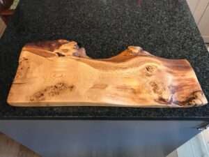 IMG 3394 Character presentation board for cheese, charcuterie, tapas, antipasti. Approx 40-60cm x 20-30cm x 3-5cm thick. Natural shape and edges often with feature holes and knots in surface. Oak/elm/ash/beech/cherry
