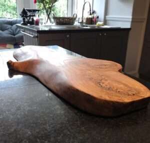 IMG 3615 Character presentation board for cheese, charcuterie, tapas, antipasti. Approx 40-60cm x 20-30cm x 3-5cm thick. Natural shape and edges often with feature holes and knots in surface. Oak/elm/ash/beech/cherry