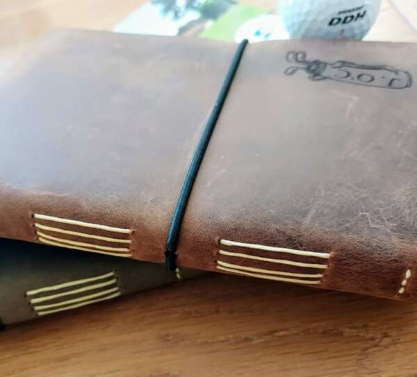 Rustic waxed leather golf journal in green and brown