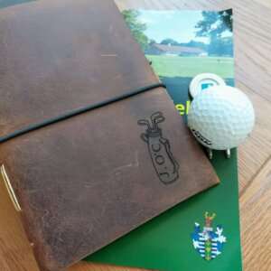 rustic waxed leather golf journal with personalised golf bag cover