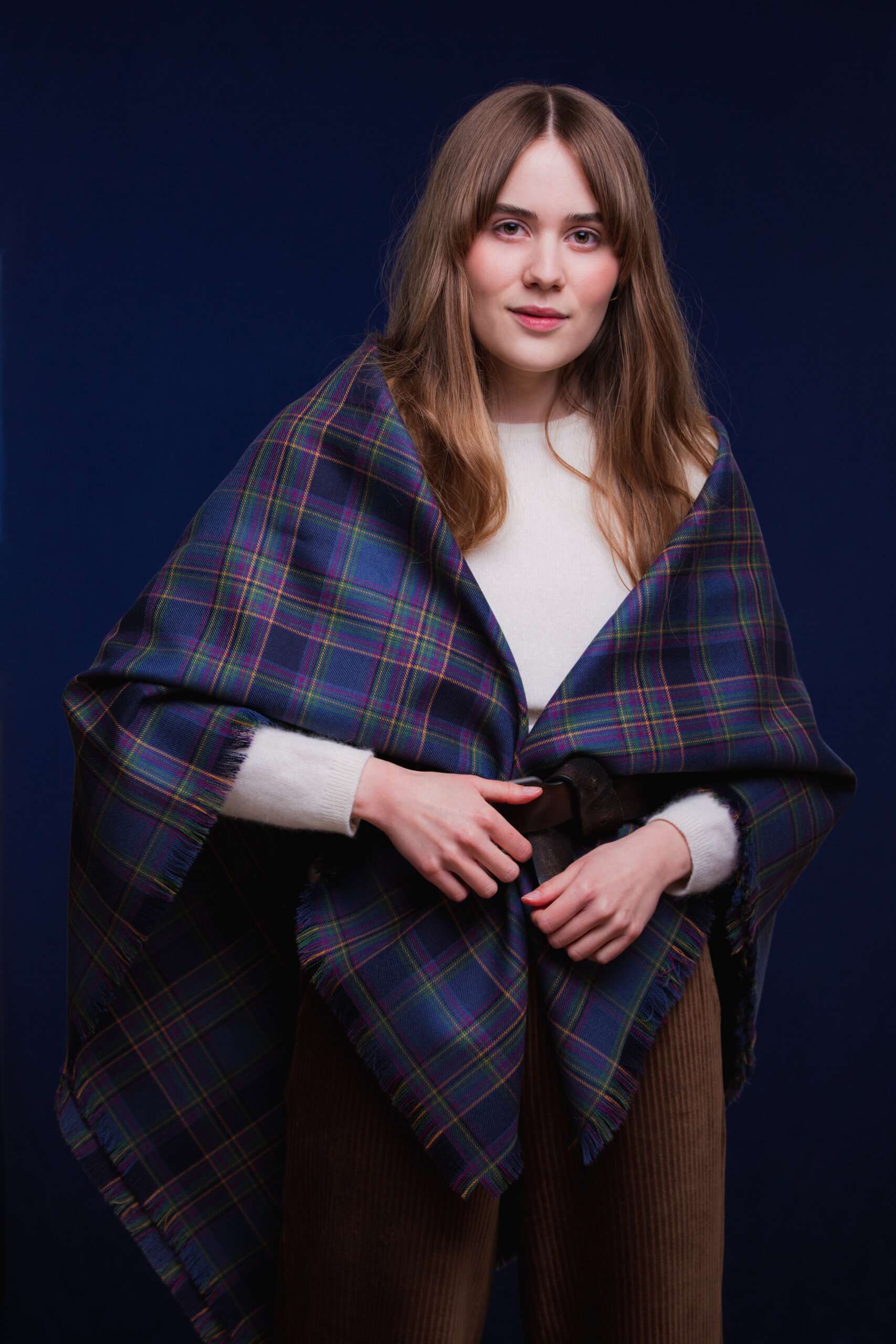 LoullyMakes Studio 4 49 scaled Classic square shawl in our own exclusive Flodden Commemorative mediumweight 13oz 100% wool tartan. This generously large shawl measures approx 145cm square and can be worn so many ways ,offering inherent insulating warmth without bulkiness- drape it , wrap it , tie it, belt it , pin it - the styling possibilities are endless. Always a comfortable accessory.