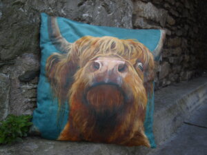 P3319740 The highland cow cushions are handmade in the UK in a high quality faux suede soft fabric. (The fabric feels lovely and soft). Cushion shipped abroad are without the filling. Free postage in the UK.