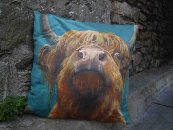 P3319740 scaled The highland cow cushions are handmade in the UK in a high quality faux suede soft fabric. (The fabric feels lovely and soft). Cushion shipped abroad are without the filling. Free postage in the UK.