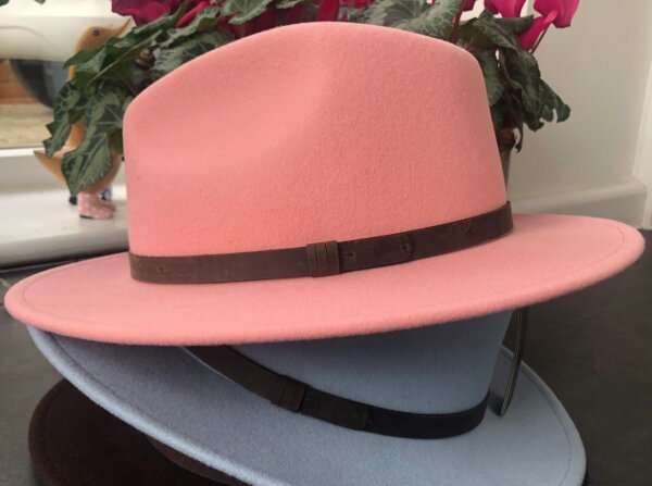 WhatsApp Image 2021 01 29 at 09.12.39 Baby Pink wool felt fedora hat with feather pin. My wool felt fedora hats are beautifully made, water resistant & come complete with a detachable natural game feather pin. Available in sizes; Extra small 53-54cm,  Small 55-56cm & Medium 57-59cm The fedora hat is made from 100% wool felt and suitable to be worn in all weathers.  If the hat does get wet just leave it to dry flat & naturally.