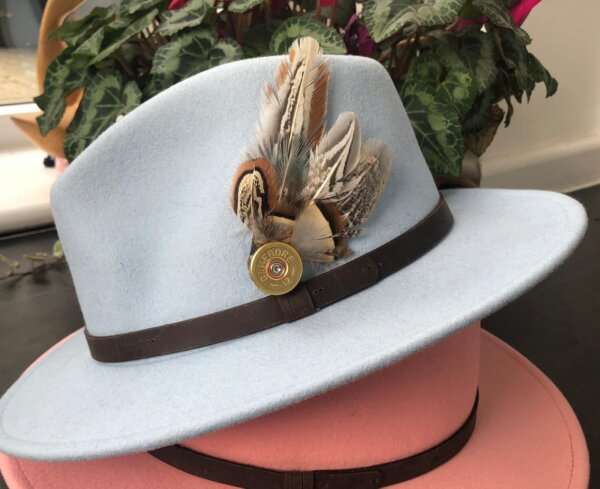 WhatsApp Image 2021 01 29 at 09.12.40 1 Grey wool felt fedora hat with feather pin. My wool felt fedora hats are beautifully made, water resistant & come complete with a detachable natural game feather pin. Available in sizes; Extra small 53-54cm,  Small 55-56cm & Medium 57-59cm The fedora hat is made from 100% wool felt and suitable to be worn in all weathers.  If the hat does get wet just leave it to dry flat & naturally.