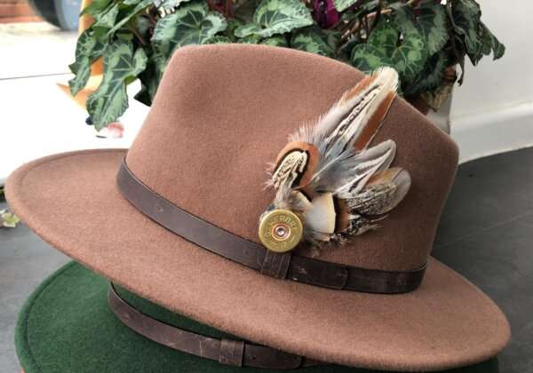 WhatsApp Image 2021 01 29 at 09.12.43 Light Brown wool felt fedora hat with feather pin. My wool felt fedora hats are beautifully made, water resistant & come complete with a detachable natural game feather pin. Available in sizes; Extra small 53-54cm,  Small 55-56cm & Medium 57-59cm The fedora hat is made from 100% wool felt and suitable to be worn in all weathers.  If the hat does get wet just leave it to dry flat & naturally.