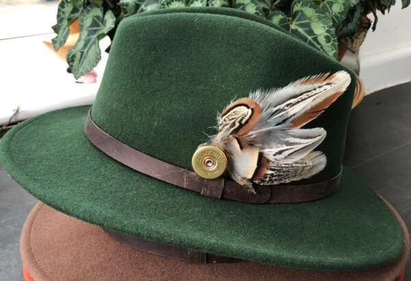 WhatsApp Image 2021 01 29 at 09.12.44 Green wool felt fedora hat with feather pin. My wool felt fedora hats are beautifully made, water resistant & come complete with a detachable natural game feather pin. Available in sizes; Extra small 53-54cm,  Small 55-56cm & Medium 57-59cm The fedora hat is made from 100% wool felt and suitable to be worn in all weathers.  If the hat does get wet just leave it to dry flat & naturally.