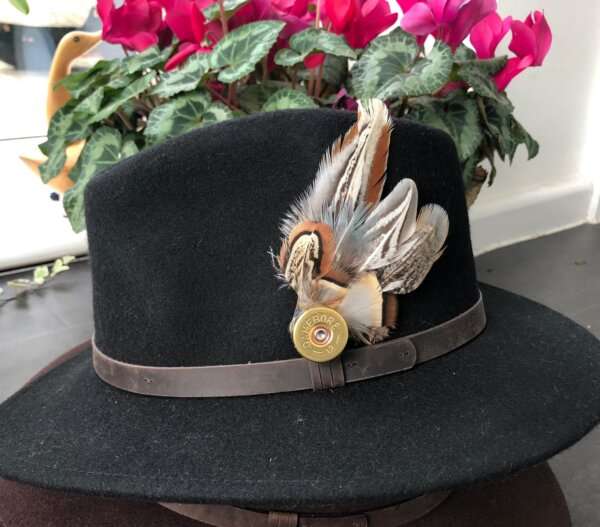 WhatsApp Image 2021 01 29 at 09.12.47 Black wool felt fedora hat with feather pin. My wool felt fedora hats are beautifully made, water resistant & come complete with a detachable natural game feather pin. Available in sizes; Extra small 53-54cm,  Small 55-56cm & Medium 57-59cm The fedora hat is made from 100% wool felt and suitable to be worn in all weathers.  If the hat does get wet just leave it to dry flat & naturally.