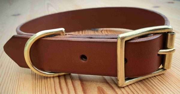 20210131 144658 scaled Hand-crafted leather dog collar. Made from the finest English full grain leather. Hand-stitched. Leather colour: black, dark brown, chestnut, tan, or natural. Solid brass or nickel-plated hardware. Personalised - add your initials, dogs name, surname, postcode, or phone number.