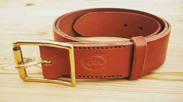 20210206 145353 scaled Hand-crafted leather belt. Made-to-measure from the finest English full grain leather. Hand-stitched. Leather colour: black, dark brown, chestnut, tan, or natural. Solid brass or nickel-plated buckle. Personalise - add embossed lettering for no additional cost. Eg, initials, name, nickname.