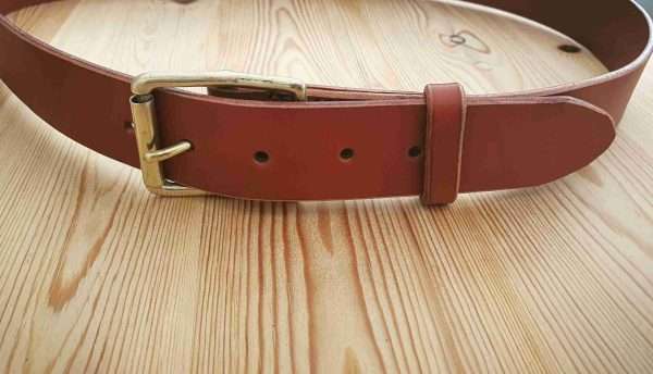 20210206 205142 scaled Hand-crafted leather belt. Made-to-measure from the finest English full grain leather. Hand-stitched. Leather colour: black, dark brown, chestnut, tan, or natural. Solid brass or nickel-plated buckle. Personalise - add embossed lettering for no additional cost. Eg, initials, name, nickname.