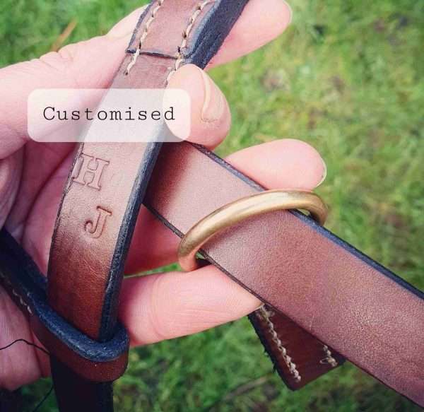 20210214 151318 scaled Hand-crafted leather slip lead, made from the finest English, full grain leather. - Hand-stitched - Solid brass ring, leather slider. - Available in black, chestnut, dark brown, tan and natural colour leather. - Length: 48 inches, width: ¾ inch. - Can be personalised with your initials, your name, or your dog's name for no additional cost.