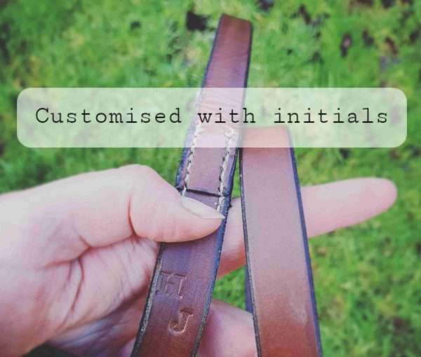 20210214 151606 1 scaled Hand-crafted leather clip lead, made from the finest English, full grain leather. - Hand-stitched - Solid brass or nickel swivel clip - Available in black, chestnut, dark brown, tan and natural colour leather - Length: Standard (38 inches), Long (48 inches). Width: 1 inch - Can be personalised with your initials, your name, or your dogs name for no additional cost.