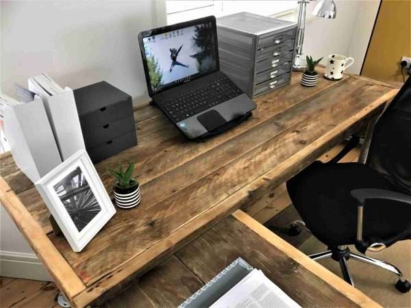IMG 0367 scaled <p style="text-align: center">The office desk is a sleek and striking statement piece that will make the very best impression in your reception space or home office. Made from reclaimed scaffold boards with reclaimed heavy-duty steel scaffold tubes for legs.</p>
