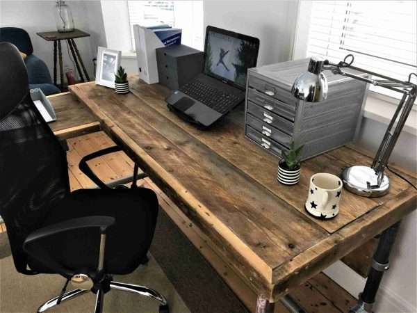 IMG 0369 scaled <p style="text-align: center">The office desk is a sleek and striking statement piece that will make the very best impression in your reception space or home office. Made from reclaimed scaffold boards with reclaimed heavy-duty steel scaffold tubes for legs.</p>