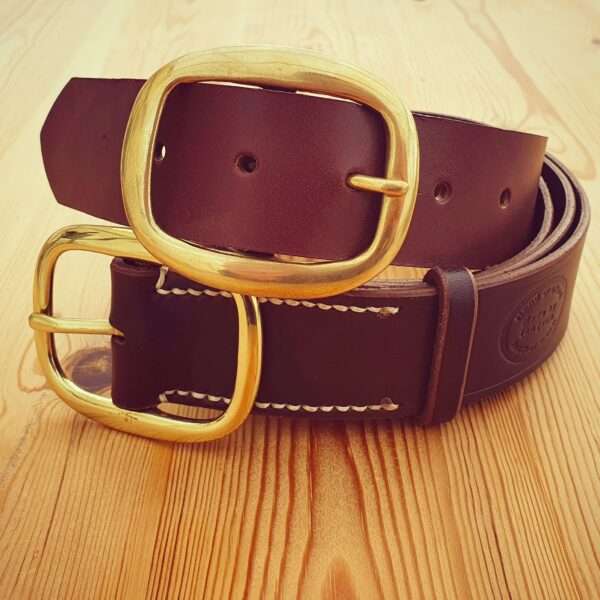 IMG 20210206 205455 024 Hand-crafted leather belt. Made-to-measure from the finest English full grain leather. Hand-stitched. Leather colour: black, dark brown, chestnut, tan, or natural. Solid brass or nickel-plated buckle. Personalise - add embossed lettering for no additional cost. Eg, initials, name, nickname.