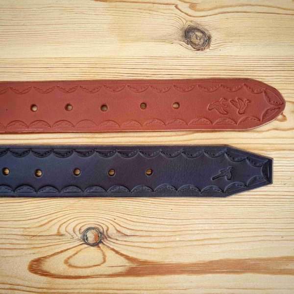 IMG 20210207 205046 858 scaled Hand-crafted embossed leather belt. Made-to-measure from the finest English full grain leather. Hand-stitched. Choose from shotgun cartridge, horse, stag head, scope cross hairs, pheasant, stag jumping, duck or fish design. Leather colour: black, dark brown, chestnut, tan, or natural. Solid brass or nickel-plated buckle. Personalise - add embossed lettering for no additional cost. Eg, initials, name, nickname.
