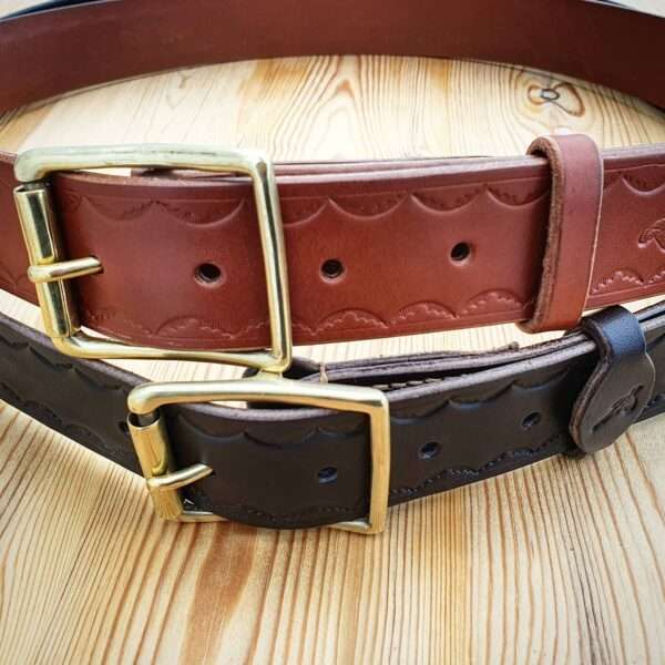 IMG 20210207 205834 440 Hand-crafted embossed leather belt. Made-to-measure from the finest English full grain leather. Hand-stitched. Choose from shotgun cartridge, horse, stag head, scope cross hairs, pheasant, stag jumping, duck or fish design. Leather colour: black, dark brown, chestnut, tan, or natural. Solid brass or nickel-plated buckle. Personalise - add embossed lettering for no additional cost. Eg, initials, name, nickname.