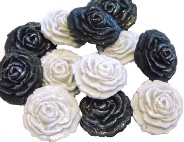 Inked12 Black silver roses LI This selection of edible small roses is shown in mixed sets, we do have them available in single colours under a separate listing. All are glittered and due to their size are extremely popular as cake fillers. These roses make Ideal cupcake and cake topper decorations for Weddings, Birthdays, Valentine and Anniversary. We hand make all our own decorations. Approx Size 2 cm