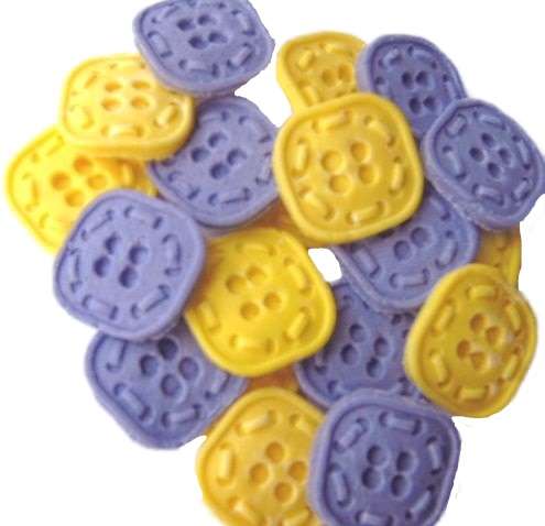 Inked18 Purple yellow Square Buttonsjpeg LI If you’re looking for colourful edible shaped buttons to decorate your cupcakes and cakes then these are ideal for all your special occasions. Offering a choice of many single and mixed colours that are sure to please. Note: we also have heart shaped buttons in same colours for those who would like to have a mix of each. 18 square shaped buttons Approx Size: 20mm wide