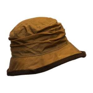 DIANA BEIGE 300x300 1 Internal Lining is 100% Cotton lining, and an inner trim band for extra comfort. Outer Shell is made from 100% waxed cotton, making this hat waterproof. This traditional waxed cap has a corduroy trim around the ruffle style brim of the hat. Produced to the highest standards by a manufacturer of top qulaity countrywear and derby clothing