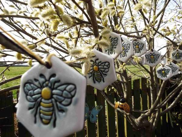 DSCF1921 scaled Beautiful handmade ceramic bunting with a bumblebee design.