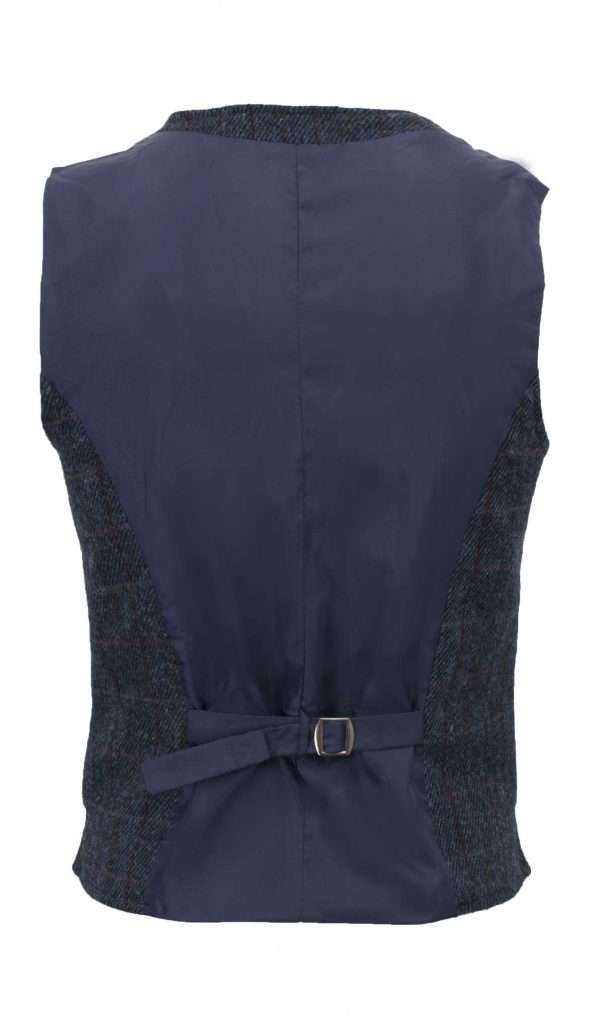 ROYAL BLUE WC BACK These world famous Harris Tweed Waistcoats are superbly tailored, hard wearing and warm. When purchasing one of these waistcoats you are guaranteed exceptional quality. By law Harris Tweed must come from the Outer Hebrides, and be hand woven from local wool. Supplied by Harris Tweed Scotland from 100% pure virgin wool, dyed, spun and finished in the Western Isles of Scotland. Hand-woven by crofters in their own homes on the islands of Lewis, Harris, Uist and Barra. Hand finished to the highest standard with four leather button fastening. Other specifications include two welter outer ticket pockets, Fully lined and Satin back lining with adjustable strap and buckle . Spare Leather Button included. Dress with matching Blazer for an extremely stylish look perfect for weddings and the races. All our tweeds are stamped with the authentic, official gold crossed orb mark of the Harris Tweed Authority.