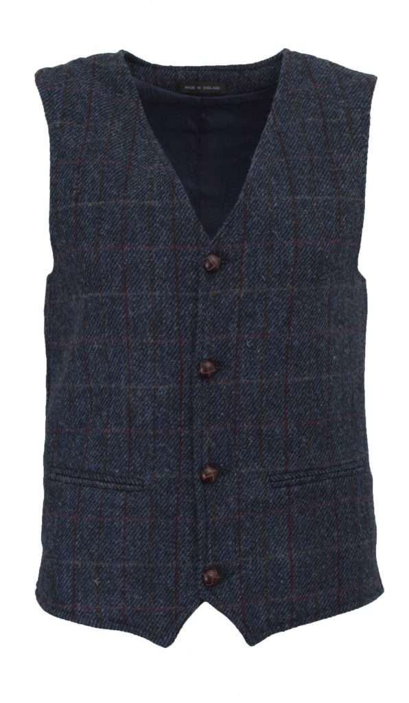 ROYAL BLUE WC FRONT These world famous Harris Tweed Waistcoats are superbly tailored, hard wearing and warm. When purchasing one of these waistcoats you are guaranteed exceptional quality. By law Harris Tweed must come from the Outer Hebrides, and be hand woven from local wool. Supplied by Harris Tweed Scotland from 100% pure virgin wool, dyed, spun and finished in the Western Isles of Scotland. Hand-woven by crofters in their own homes on the islands of Lewis, Harris, Uist and Barra. Hand finished to the highest standard with four leather button fastening. Other specifications include two welter outer ticket pockets, Fully lined and Satin back lining with adjustable strap and buckle . Spare Leather Button included. Dress with matching Blazer for an extremely stylish look perfect for weddings and the races. All our tweeds are stamped with the authentic, official gold crossed orb mark of the Harris Tweed Authority.