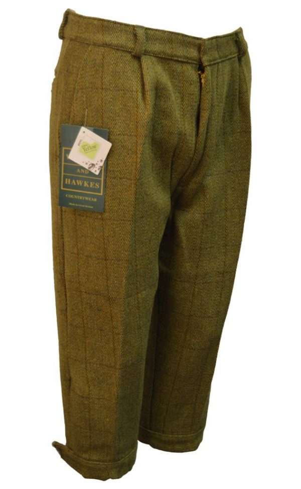 breeks light side Internal linning is 100% Cotton, for extra warmth and comfort. Outer shell is made from 60% Wool, 25% Polyester, 11% Acrylic and 4% composed of other fibres, making this product of top quality fabric. Other features of this classic cut tweed breek are 2 side pockets, 1 back pocket with buttoned flap enclosure, strong brass front zip, velcro adjustable calf straps, dropped belt loops and elasticated grip waistband The tweed has been treated with Teflon which acts as a fabric protector, making this product long-lasting protection against oil- and water-based stains, dust and dry soil. Produced to the highest standards by a manufacturer of top quality countrywear and derby clothing.