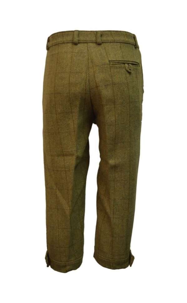 breeks light tweed back Internal linning is 100% Cotton, for extra warmth and comfort. Outer shell is made from 60% Wool, 25% Polyester, 11% Acrylic and 4% composed of other fibres, making this product of top quality fabric. Other features of this classic cut tweed breek are 2 side pockets, 1 back pocket with buttoned flap enclosure, strong brass front zip, velcro adjustable calf straps, dropped belt loops and elasticated grip waistband The tweed has been treated with Teflon which acts as a fabric protector, making this product long-lasting protection against oil- and water-based stains, dust and dry soil. Produced to the highest standards by a manufacturer of top quality countrywear and derby clothing.