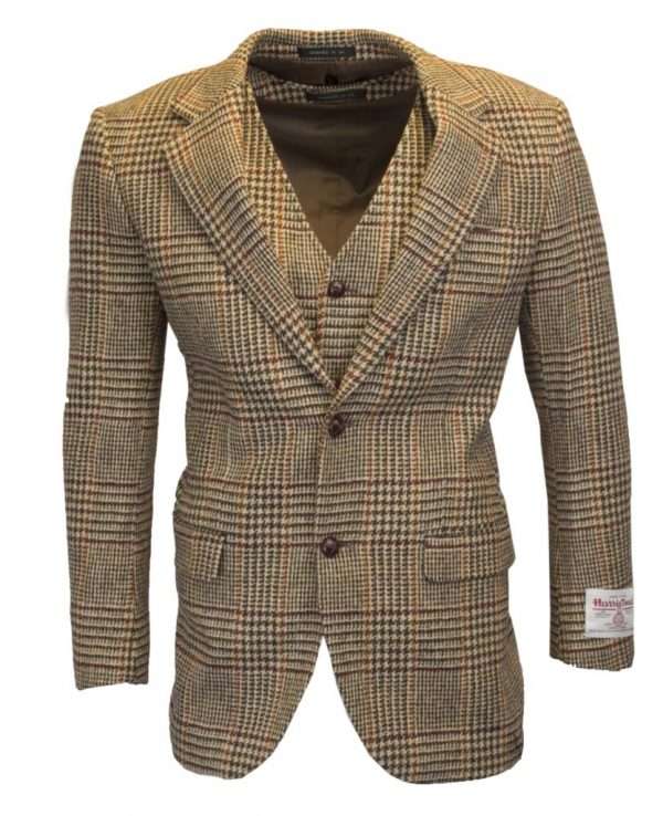 dessert tan blazer wc 1 These world famous Harris Tweed jackets, are superbly tailored, hard wearing and warm. When purchasing one of these jackets you are guaranteed exceptional quality. By law Harris Tweed must come from the Outer Hebrides, and be hand woven from local wool. Supplied by Harris Tweed Scotland from 100% pure virgin wool, dyed, spun and finished in the Western Isles of Scotland. Hand-woven by crofters in their own homes on the islands of Lewis, Harris, Uist and Barra. They are single breasted with two leather button fastening, and can be worn as a casual jacket or with a shirt and tie. Other specifications include side vents, two front pockets with flaps, Four interior pockets, three button leather cuff and Fully lined. Spare Button Leather buttons included. Dress with matching waistcoat for an extremely stylish look perfect for weddings and the races. All our tweeds are stamped with the authentic, official gold crossed orb mark of the Harris Tweed Authority.