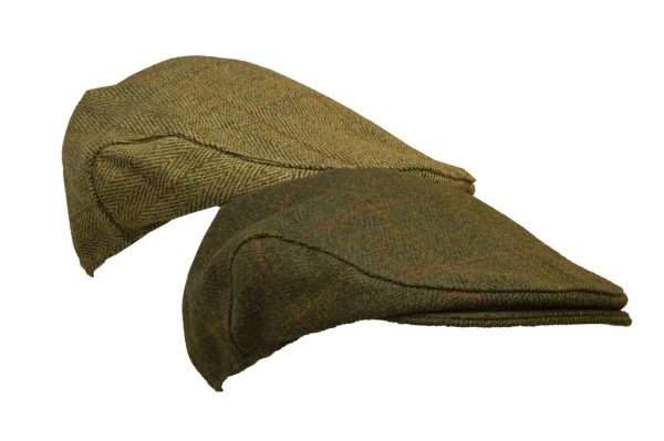 tweed Inner Linning is 100% Polyester satin lining, with an inner trim band for extra comfort. Outer jacket (shell) is made from 60% wool, 25% polyester, 11% acrylic and 4% composed of other firbres, making this cap of top quality fabric. Produced to the highest standards by a manufacturer of top quality countrywear and derby clothing. The tweed has been treated with teflon, which acts as a fabric protector, making this product long lasting-lasting protection against oil- and water-based stains, dust and dry soil. Please check our size guide against your cap you wish to purchase.