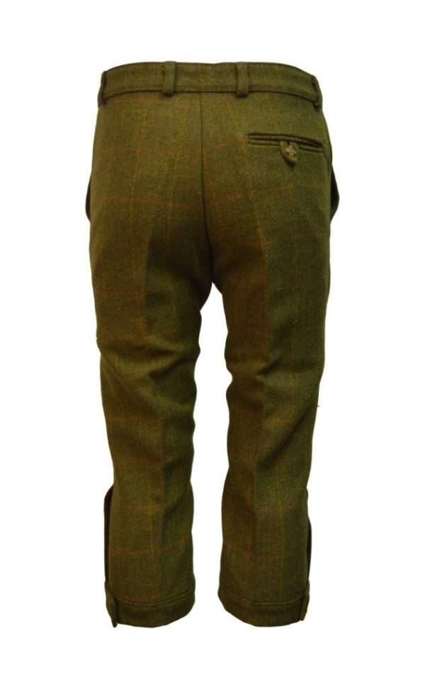 tweed breeks dark back Internal linning is 100% Cotton, for extra warmth and comfort. Outer shell is made from 60% Wool, 25% Polyester, 11% Acrylic and 4% composed of other fibres, making this product of top quality fabric. Other features of this classic cut tweed breek are 2 side pockets, 1 back pocket with buttoned flap enclosure, strong brass front zip, velcro adjustable calf straps, dropped belt loops and elasticated grip waistband The tweed has been treated with Teflon which acts as a fabric protector, making this product long-lasting protection against oil- and water-based stains, dust and dry soil. Produced to the highest standards by a manufacturer of top quality countrywear and derby clothing.