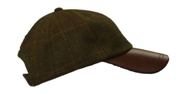 tweed leather peak baseball cap side Inner Linning is 100% Polyester satin lining, with an inner trim band for extra comfort. Outer jacket (shell) is made from 60% wool, 25% polyester, 11% acrylic and 4% composed of other fibres, making this cap of top quality fabric. Adjustable Velcro fitting with matching tweed lined band. Produced to the highest standards by a manufacturer of top quality countrywear and derby clothing. The tweed has been treated with teflon, which acts as a fabric protector, making this product long lasting-lasting protection against oil- and water-based stains, dust and dry soil.