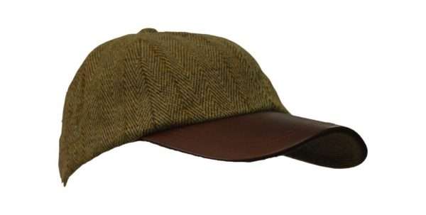 tweed leather peak baseball cap. sidejpg Inner Linning is 100% Polyester satin lining, with an inner trim band for extra comfort. Outer jacket (shell) is made from 60% wool, 25% polyester, 11% acrylic and 4% composed of other fibres, making this cap of top quality fabric. Adjustable Velcro fitting with matching tweed lined band. Produced to the highest standards by a manufacturer of top quality countrywear and derby clothing. The tweed has been treated with teflon, which acts as a fabric protector, making this product long lasting-lasting protection against oil- and water-based stains, dust and dry soil.