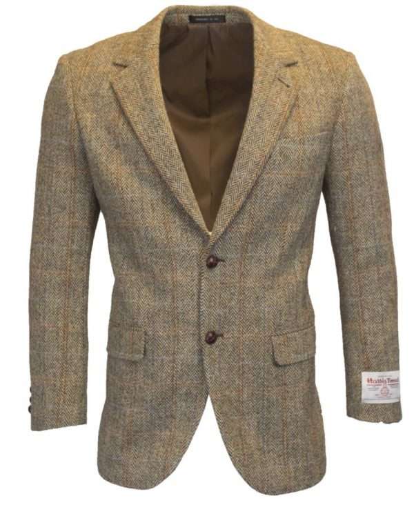 white sand blazer front 1 These world famous Harris Tweed jackets are superbly tailored, hard-wearing and warm. When purchasing one of these jackets you are guaranteed exceptional quality. By law Harris Tweed must come from the Outer Hebrides, and be hand woven from local wool. Supplied by Harris Tweed Scotland from 100% pure virgin wool, dyed, spun and finished in the Western Isles of Scotland. Expertly hand-woven by crofters in their own homes on the islands of Lewis, Harris, Uist and Barra. They are single breasted with two leather button fastening, and can be worn as a casual jacket or with a shirt and tie. Other specifications include side vents, two front pockets with flaps, Four interior pockets, three button leather cuff and Fully lined. Spare Button Leather buttons included. Dress with matching waistcoat for an extremely stylish look perfect for weddings and the races. All our tweeds are stamped with the authentic, official gold crossed orb mark of the Harris Tweed Authority.