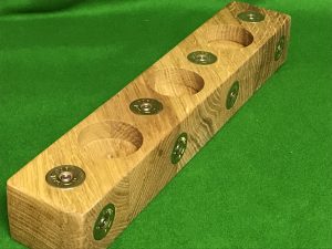 CF15F391 0D06 4F04 BC95 9BBF8C29A173 A beautiful bespoke solid oak tea light holder with brass shotgun cartridge ends inlaid to a flush finish coated with 2 coats of finishing oil to protect both the wood and the brass ends Please note the natural grain and colour of the wood will be different in every piece so each one will be unique