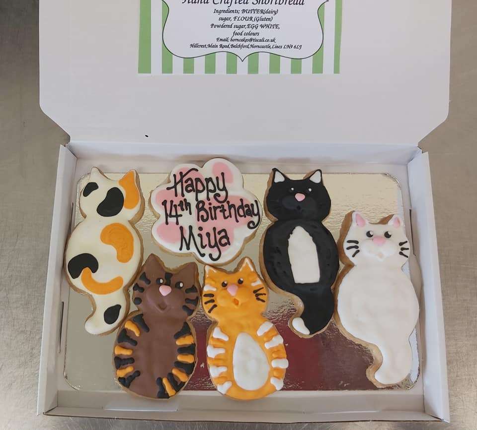 A box of all butter shortbread biscuits, hand iced with royal icing in the shape of cats. These can be personalised with a message and name.