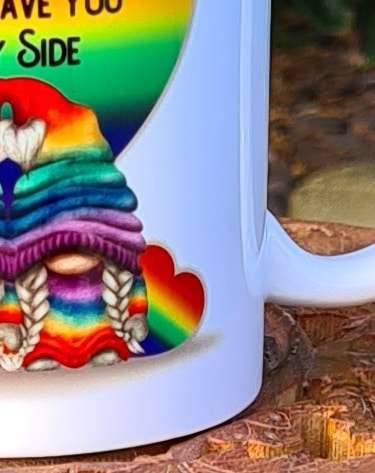 20220115 125644 Are you looking for a mug for your other half to say you are proud they are by your side? This could be the perfect one with bright rainbow colours and a choice of male and female gnomes. UK postage included and will be posted within a week of ordering.
