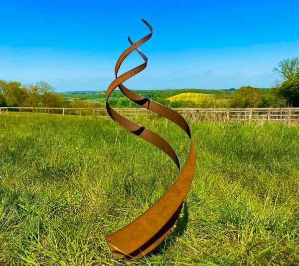 WELCOME TO THE RUSTIC GARDEN ART SHOP Here we have one of our. Rustic Spiral Fire Energy Flowing Organic Metal Sculpture **Sizes are approximate and design is approximate - each spiral is handmade and comes out slightly different** Sizes & Measurements:
XLarge: 170cm x 63cm x 5mm *PLEASE NOTE XL SIZES GOING TO PLACES OTHER THAN THE UK - WILL HAVE REMOVABLE STAKES*