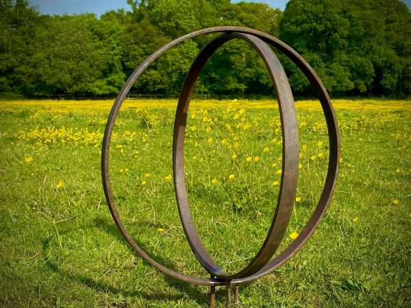 WELCOME TO THE RUSTIC GARDEN ART SHOP Here we have one of our. Rustic Metal Garden Ring Hoop Sculpture - Pair of Rusty Ring Circle Garden Art / Globe / Sphere Interchangeable metal ring sculptures - one is slightly smaller so fits within the other ring with two stakes per ring. Enabling you to arrange your own formation or design. These two rustic garden rings make a unique, versatile garden sculpture. Arrange the rusty metal rings in any formation to create your very own unique piece of affordable garden decor. Our Rustic/Rusty patina gives a natural and unique finish, which will continue to better with age. Our rustic garden art products require absolutely no maintenance! Sizes & Measurements:
Medium: approx 50cm diameter - made from flat steel 30mm x 8mm