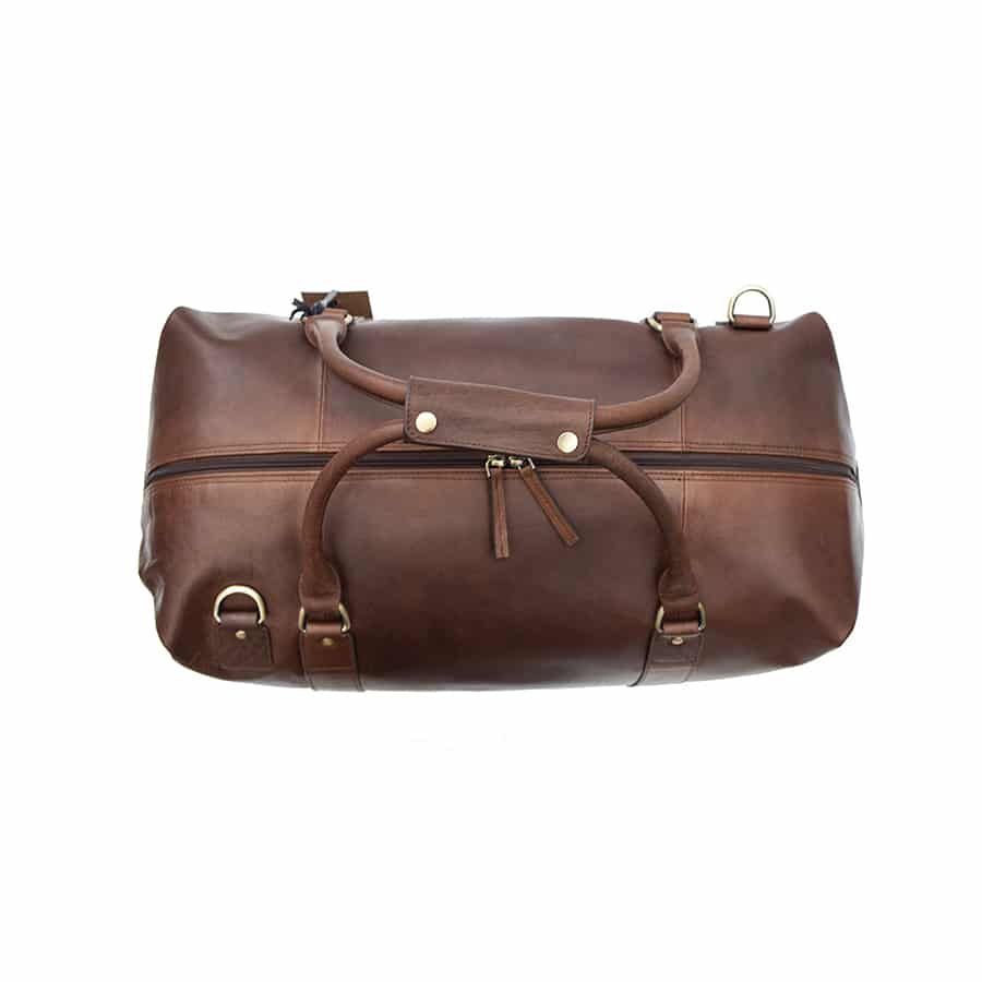 670col w4 Make the most our spacious Wombat Colombian travel bag when you are getting ready for your next long weekend away.This is the perfect bag for anyone who loves to travel in real style and stand out from almost any other bag you’ll find. The smooth bronzed leather and brass detail also makes it the ideal present for a special occasion.