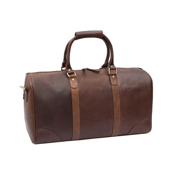 9001col w1 The Wombat Luxury Holdall is a chic and stylish holdall that comes in a rich, beautiful brown color. Its soft, supple leather gives you a luxurious look and feel that is unmatched.  This holdall’s best feature is the unbelievable leather quality. It’s made from oiled leather that is very thick that can stand up to anything you can throw at it.