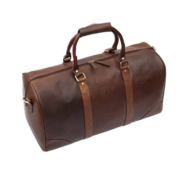 9001col w2 The Wombat Luxury Holdall is a chic and stylish holdall that comes in a rich, beautiful brown color. Its soft, supple leather gives you a luxurious look and feel that is unmatched.  This holdall’s best feature is the unbelievable leather quality. It’s made from oiled leather that is very thick that can stand up to anything you can throw at it.